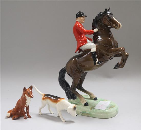A Beswick hunting horse, rider, fox and hound (3)